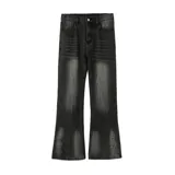 Pantalón tipo jean Oxford unisex con efecto de lavado desgastado en tonos oscuros y ocres. Presenta corte recto con ligera apertura en el bajo, pinzas decorativas en los tobillos y cintura con elástico en la parte trasera.