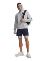 Short deportivo Under Armour modelo Vanish Woven de color azul marino, con diseño ultraligero, transpirable y de secado rápido, que incluye bolsillos laterales y cintura elástica.