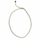 Collar delicado compuesto por perlas barrocas naturales intercaladas con pequeñas cuentas metálicas doradas. Cuenta con cierre de mosquetón y cadena de extensión para ajustar el largo.