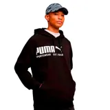 Canguro negro con capucha y cordones ajustables, confeccionado en algodón y poliéster. Presenta estampado frontal con el logo de la marca y la inscripción Sportswear Est. 1948 en color blanco.