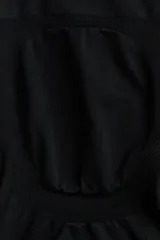 Culotte de punto color negro, de tiro alto, con efecto moldeador en cintura y caderas, y efecto push-up en los glúteos. Diseñado con el mínimo de costuras para un ajuste cómodo y una sensación suave.