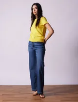 Buzo tejido en hilado fino color naranja, marca Ninety.