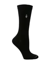 Medias de largo medio color negro, con puño suave y logo bordado de la marca en la parte superior.