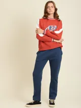 Pantalón tipo babucha de algodón y poliéster, color azul marino, con cintura elástica ajustable mediante cordón y corte recto.