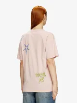 Camiseta rosa de algodón con estampado de hada y estrellas.