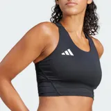 Top deportivo negro con logo de Adidas en blanco, corte ajustado, escote redondo y espalda cruzada.