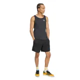 Musculosa de algodón acanalado en color negro, con cuello redondo y logo de Adidas Originals bordado en blanco en el pecho.
