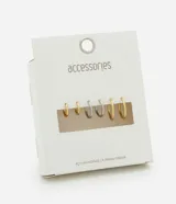 Kit de tres pares de aros tipo argolla en tamaños gradativos, fabricados en acero inoxidable con acabado metálico brillante. Incluye aros en tonos dorado y plateado.