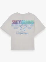 Camiseta de corte boxy y fit relajado, con cuello redondo y mangas cortas. Presenta una estampa minimalista en el frente y está confeccionada en tejido interlock de algodón.