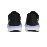 Championes Puma Transport Modern Running color gris, con detalles en blanco y suela blanca.