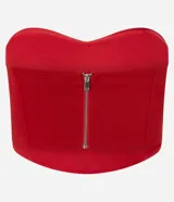 Blusa tipo corset cropped color rojo, con escote corazón y cierre posterior por cremallera. Confeccionada en bengalina, presenta un diseño ajustado al cuerpo.