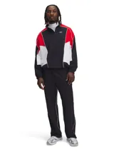 Campera deportiva Under Armour para hombre, de corte holgado, con cierre frontal de medio largo, cuello alto y mangas largas. Diseño color block en negro, rojo y blanco con logo bordado en el pecho.