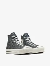Championes Converse Chuck Taylor All Star Lift de caña alta, color negro con glitter, plataforma blanca y cordones blancos.