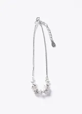 Pulsera de cadena veneciana de plata 925 con dijes cilíndricos pavé de zirconias y cierre de mosquetón con cadena de extensión.