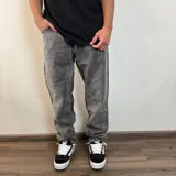 Jean mom oversize de hombre, color celeste claro con efecto acid wash.