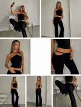 Conjunto compuesto por un top negro con cuello halter cruzado y un pantalón negro de tiro bajo con aberturas laterales en la cintura.