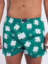 Bóxer de algodón blanco con estampado de flores pequeñas color celeste, con cintura elástica y logo de la marca en el centro.