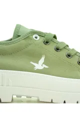 Championes de lona verde con suela chunky blanca acanalada y puntera de goma blanca. Presentan cordones al tono y el logo de la marca impreso en color blanco en el lateral.