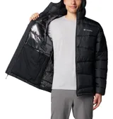 Campera puffer Columbia con capucha, color negro, con cierre frontal completo y bolsillos laterales con cremallera. Cuenta con tecnología Omni-HEAT de reflectividad térmica y aislamiento Thermarator.