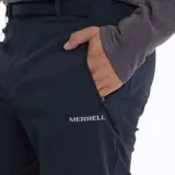 Pantalón de trekking desmontable color azul marino, con cintura ajustable mediante cinturón integrado y múltiples bolsillos con cierre.