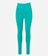Pantalón legging deportivo color marrón con cintura alta en contraste color blanco. Confeccionado en tejido de poliamida y elastano, de ajuste ceñido al cuerpo.