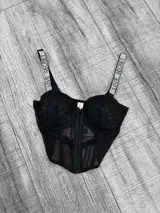 Top corset con copas preformadas y encaje, con cierre frontal y tiras con strass con la inscripción "LOVE SECRET".