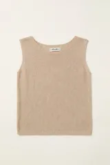 Top tejido de punto color beige melange, sin mangas, con escote redondo y terminaciones en rib.