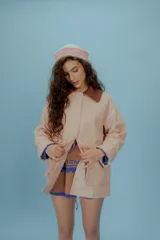 Campera reversible con tela a prueba de agua, talle único oversized hasta 110 cm de busto.