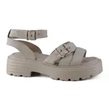 Sandalias negras de cuero con plataforma track y tiras anchas con hebillas ajustables.