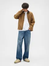 Remera de manga larga con cuello redondo, confeccionada en tejido de algodón liso.