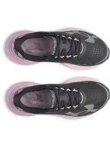 Championes de running Under Armour modelo W Velociti Distance, color negro con detalles en rosado y violeta, capellada de malla transpirable y suela con amortiguación HOVR+.