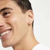 Aro piercing de aleación de metales bañado en oro de 18k con forma de calavera.