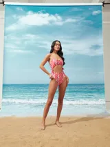 Malla entera color verde con abertura en la zona abdominal y lazos laterales.