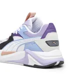 Championes Puma RS-Pulsoid, color blanco con detalles en lila, violeta, celeste y negro. Confeccionados con empeine textil y revestimientos de gamuza, tecnología de amortiguación RS System en la mediasuela y suela exterior de goma.