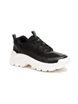 Sneakers de mujer Caterpillar modelo Intruder Lite Vent, de color negro con suela chunky blanca de EVA. Combinan paneles de malla transpirable y material sintético, con cordones negros y tiradores en la lengüeta y el talón.