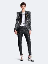 Remera blanca de algodón con estampado de la frase 'Je t'aime' en negro, de la marca Balmain.