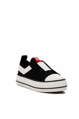 Zapatillas deportivas Pony modelo GMH 321, de lona blanca sin cordones, con inserción elástica azul en el empeine, suela con plataforma baja y detalles en rojo y negro.