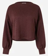 Suéter marrón de punto con textura diferenciada, cuello redondo y mangas abullonadas.