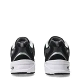 Championes New Balance 530, diseño estilo running retro, color negro con detalles en gris y blanco, con la característica "N" en el lateral y entresuela con tecnología ABZORB.