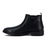 Bota de cuero negro con elástico lateral y suela de goma.