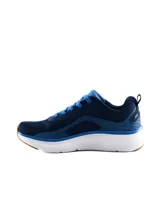 Championes de running Umbro modelo Bron, color azul marino con detalles en celeste, suela blanca gruesa y suela exterior de goma color tostado.
