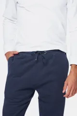 Pantalón deportivo azul marino de felpa de algodón con corte recto.