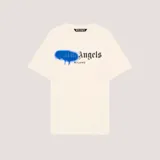Camiseta de algodón color beige con estampado frontal que combina el logo de la marca en tipografía gótica con un efecto de aerosol azul sobre la palabra Palm.