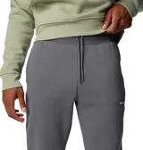 Pantalón de jogging gris Columbia modelo Meridian Creek, de corte relajado, con cintura elástica con cordón ajustable, bolsillos laterales y puños elásticos en los tobillos.
