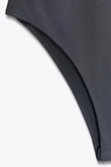 Body de manga larga confeccionado en mezcla de poliamida, con cuello redondo y cierre inferior con botones a presión.