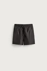 Short de baño negro de tejido técnico, con cintura elástica ajustable con cordón, bolsillos laterales y forro interior, perteneciente a la colección especial Aaron Levine x Zara.