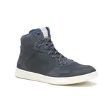 Bota urbana de caña media Caterpillar, confeccionada en gamuza encerada color azul marino. Presenta cordones jaspeados, interior con detalles en azul vibrante y suela de goma blanca con textura antideslizante.