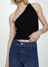 Jeans culotte de tiro alto en color azul, confeccionado en tejido vaquero elástico con bajo deshilachado y cierre de cremallera y botón.