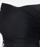 Blusa femenina confeccionada en tul negro, con escote hombro a hombro cruzado, mangas largas transparentes y textura fruncida. Diseño elegante y sofisticado de la marca Blue Steel.