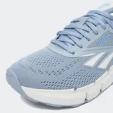 Championes Reebok Zig Dynamica 6 color celeste con detalles en blanco.